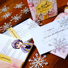 Load image into Gallery viewer, Die Cut Queen's custom snowflakes, January inserts and packaging by Lisa McCarrell Creative for The Bra Market at www.thebramarket.com.